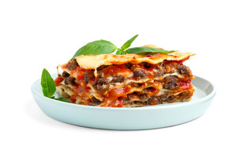 Delicious cooked lasagna with basil isolated on white