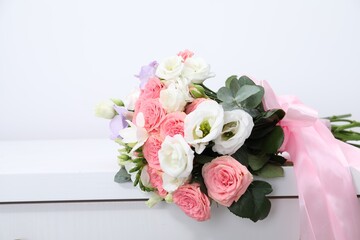 Beautiful wedding bouquet on white table, closeup. Space for text