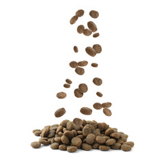 Dry pet food falling onto heap on white background