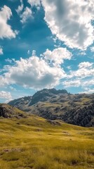 Fototapeta premium Timelapse Capturing Clouds Racing Across a Breathtaking Mountain Landscape Under a Vibrant Blue Sky. Generative AI