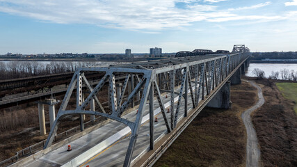 Obraz premium Bridges and Train Tracks Over Water