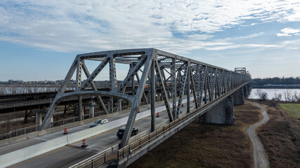 Obraz premium Bridges and Train Tracks Over Water