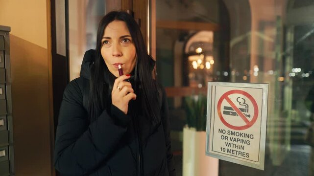 Urban Evening A Woman Deep in Contemplation, Holding a Vape, Surrounded by a Calm and Relaxed Atmosphere