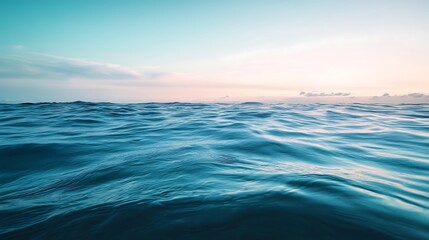 Fototapeta premium Vast Ocean Surface at Sunrise. Concept of Serenity, Tranquility, and Nature.