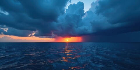 Obraz premium Ocean Sunset Dramatic Cloudscape A Breathtaking View of the Setting Sun Behind Imposing Dark Clouds Over the Water