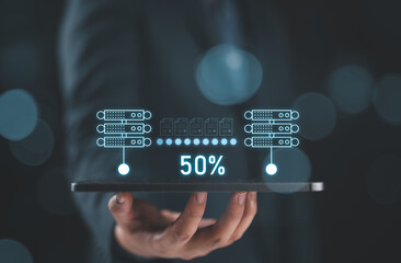 Businessman hand using tablet with data host server storage icon for information exchange and transfer concept. Transfer data.