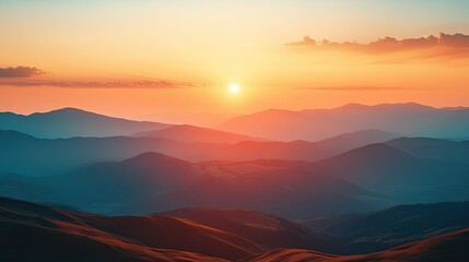Fototapeta premium Majestic Sunset Over Rolling Mountains: A Serene Landscape