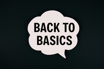 Back To Basics text with speech bubble on green background