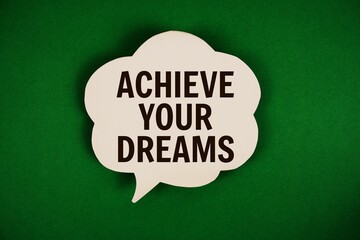 Achieve Your Dreams text with speech bubble on green background