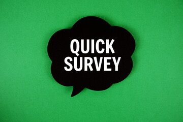 Quick Survey text with speech bubble on green background