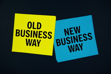 Old Business Way vs New Business Way text message on stick note on black background