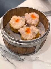various dim sum menus on the table