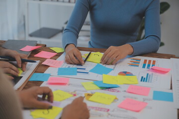 Fototapeta premium Team of business people working together in the meeting room office, teamwork background charts and graphs banner, double exposure successful teamwork,business planning concept.