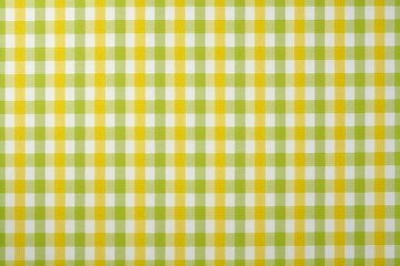 a close up of a yellow and white checkered table cloth