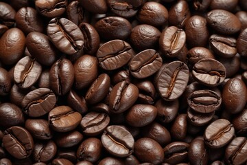 Obraz premium a close up of a pile of coffee beans with a few brown ones