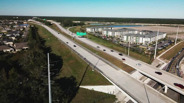 Drone View of Florida 9B at Race Track Road Moving Towards I-95 Interchange Tracking the Highway