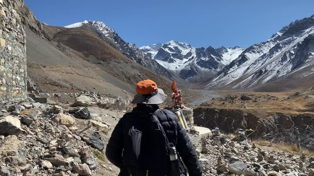 Pilgrim visits Om Parvat, a sacred peak in the Himalayas whose snow deposition pattern resembles the sacred 'Om'. Situated in Uttarakhand, India