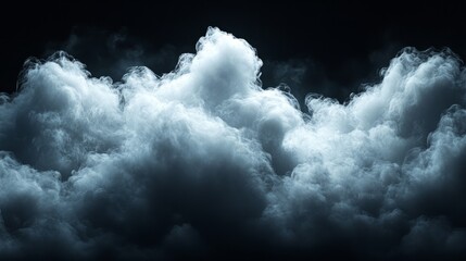 Obraz premium A soft, cotton-like white cloud isolated on a dark black background, simple and serene