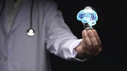 Close up of doctor holding and picking light bulb with human brain anatomy hologram. Smart medical worker representing medical data for curing brain disorder by using technology innovation. Remedial. - Powered by Adobe
