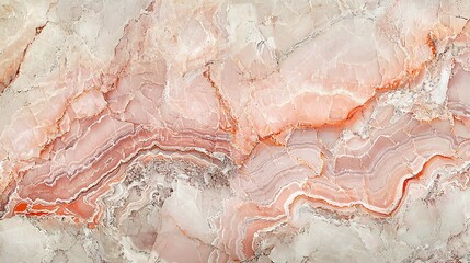 Close-up of pink and beige marble texture with swirling patterns and veins.