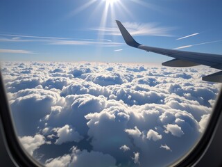 Obraz premium Aerial View Airplane Wing Over Stunning Cumulus Cloudscape Sunny Sky