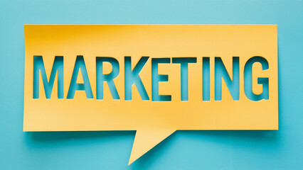 A yellow text balloon with the word “MARKETING” cut out of it is shown on a light blue background