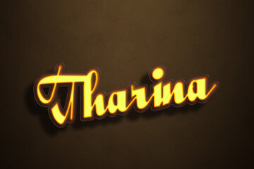 Yellow Neon Light Text Effect of name Tharina on Golden background.