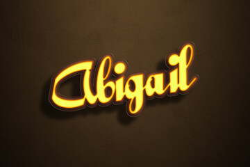 Yellow Neon Light Text Effect of name Abigail on Golden background.