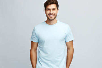 Fototapeta premium A Stylish T-Shirt Advertising Mockup: Young Man Model Wearing a Short Sleeve Light Blue T-Shirt