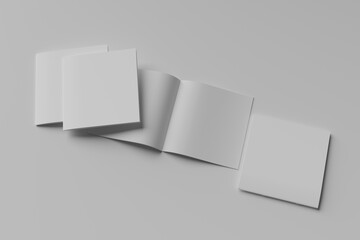 stack of three Open and closed blank brochures on grey background