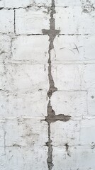 Repaired cracks on white concrete wall texture.