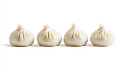Obraz premium Four steamed dumplings arranged in a row on white background. (1)