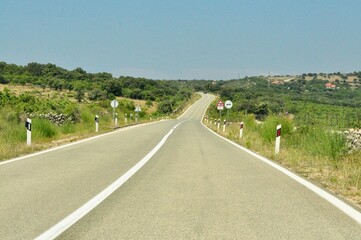 Prairie highway. Long stretch of flat highway in Rijeka, Croatia. Highway Rijeka Zagreb.Nobody On Highway In Springtime. Early in the morning, nobody on the road on a beautiful day.
