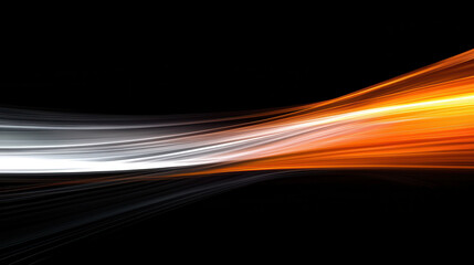 Light streaks in orange and white colors on a black background