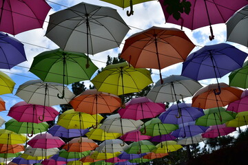 colorful umbrellas  aginst the sky at the lower station on the cable car in Pyatigorsk