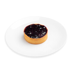 Dessert tartlet with wild berries, on a white background, isolated. Top view.