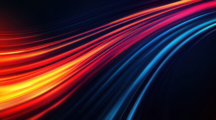 Long exposure photograph of blue and orange light trails on the road, against a black background