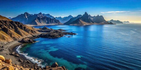 Obraz premium Deep blue oceans surround a barren landscape of dark grey mountains and rocks