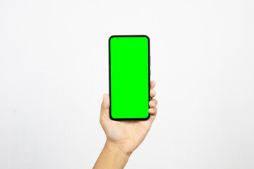 Hand holding smartphone with blank screen isolated on white background