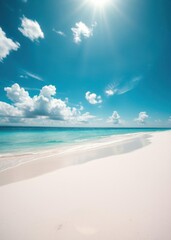 A serene beach scene with white sand clear blue water and a bright sky with fluffy clouds beach wallpaper summer wallpaper beach background tropical nature