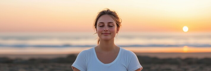 Mindful living and wellness spirituality concept. Relaxed woman meditating on the beach at sunset.