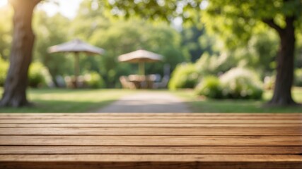 Outdoor wooden table in a serene park setting with umbrellas and lush greenery