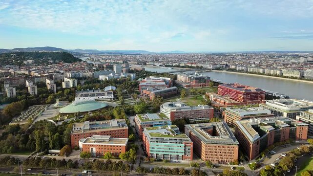 Budapest skyline with the university district and downtown Pest along the Danube and the Buda Hills in the background on a cloudy day in Hungary.