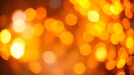 A de-focused abstract background featuring shimmering glitter lights in blue, gold, and black hues.