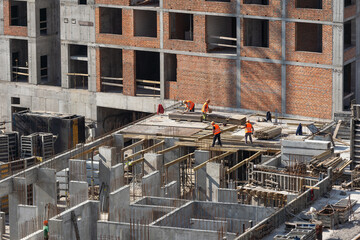 Top view of construction site during concreting of basement stairs