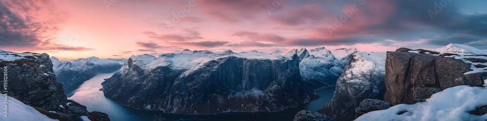Poster Aerial panorama of Trolltunga surrounded by layers of cliffs and snow-dusted peaks glowing under twilight hues. in 4K resolution