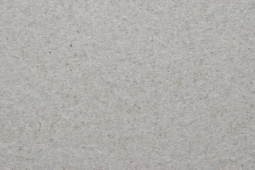 A sheet of gray recycled cardboard texture as background