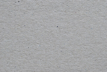 Fototapeta premium A sheet of gray recycled cardboard texture as background