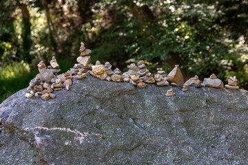 Small stone towers on a large rock