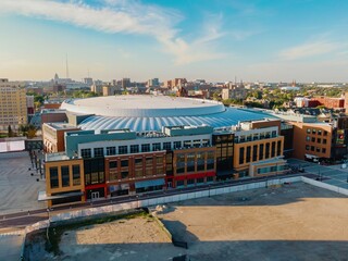 Aerial view of Little Caesars Arena, Detroit, with surrounding city buildings. Construction site visible. LITTLE CAESARS ARENA, DETROIT, MICHIGAN, UNITED STATES © Zenstratus